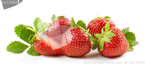 Image of fresh red strawberries with green leaves