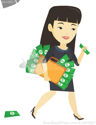 Image of Business woman with briefcase full of money.