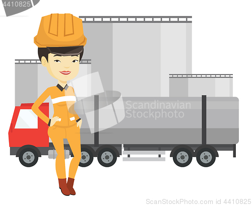 Image of Worker on background of fuel truck and oil plant.