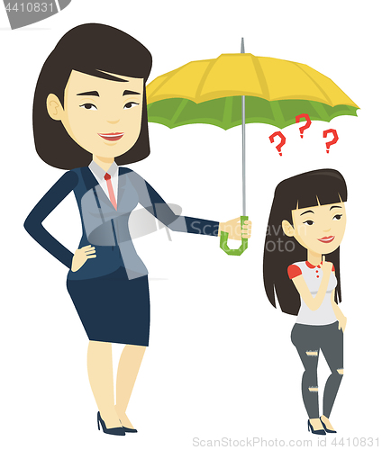 Image of Businesswoman holding umbrella over woman.