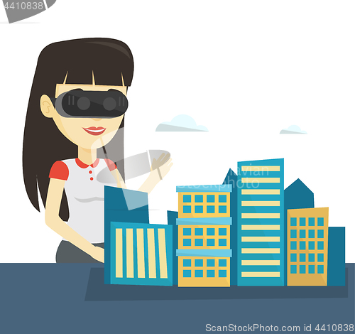 Image of Happy young woman wearing virtual reality headset.