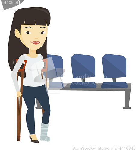 Image of Woman with broken leg and crutches.
