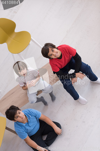 Image of boys in a new modern home