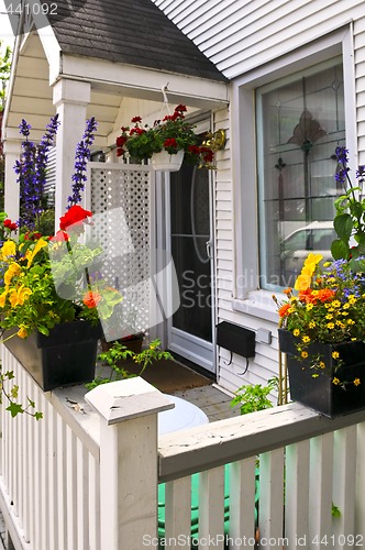 Image of House porch with flower boxes