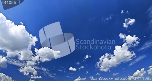 Image of Panoramic blue sky with white clouds