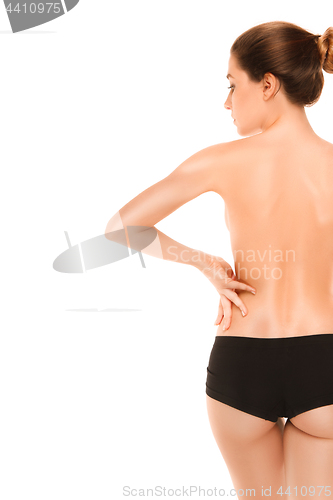 Image of beautiful woman\'s body on white background. isolated nude woman back