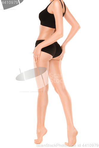 Image of Long pretty woman legs isolated on white background