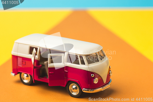 Image of Vintage miniature bus in trendy color, travel concept