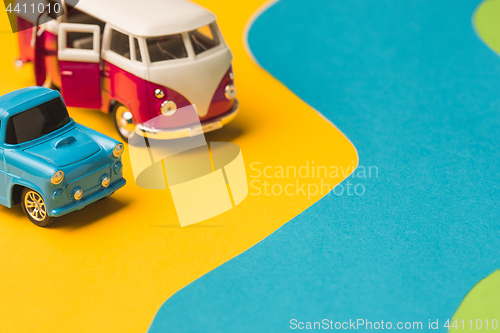 Image of Vintage miniature car and bus in trendy color, travel concept