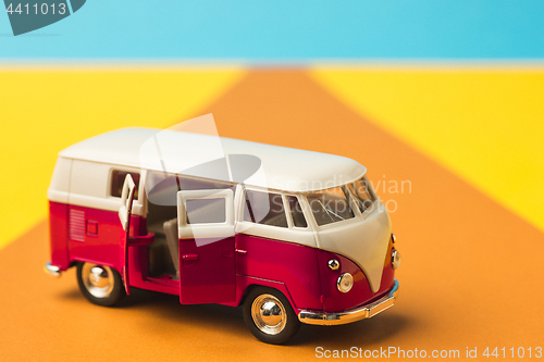 Image of Vintage miniature bus in trendy color, travel concept