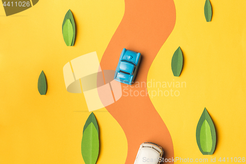 Image of Vintage miniature car and bus in trendy color, travel concept