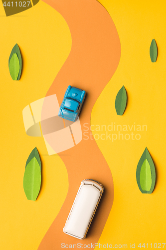 Image of Vintage miniature car and bus in trendy color, travel concept