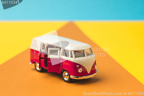 Image of Vintage miniature bus in trendy color, travel concept