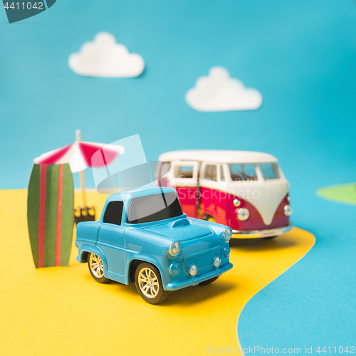 Image of Vintage miniature car and bus in trendy color, travel concept