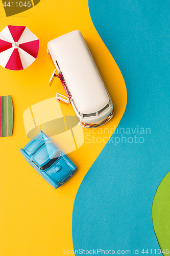 Image of Vintage miniature car and bus in trendy color, travel concept