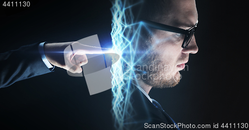 Image of businessman hand connecting to virtual network