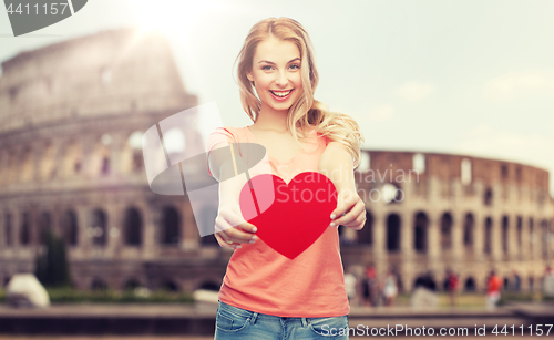 Image of happy woman or teen girl with red heart shape