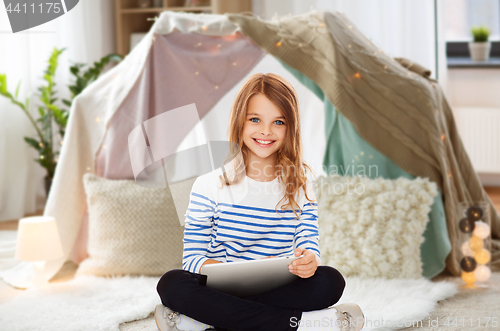 Image of student girl with tablet pc at home