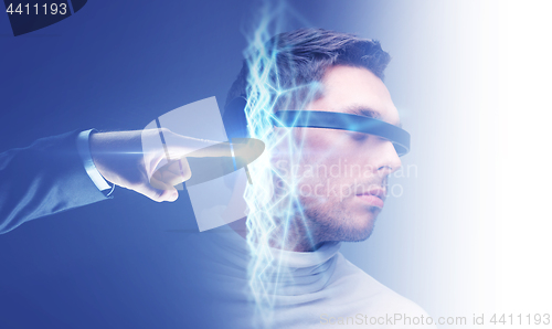 Image of businessman hand connecting to virtual network