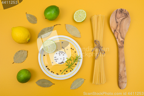 Image of Cooking ingredients on yellow background