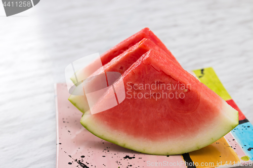 Image of Juicy watermelon on a bright ceramic plate