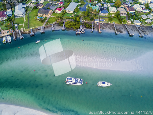 Image of Boats in the shallow channel