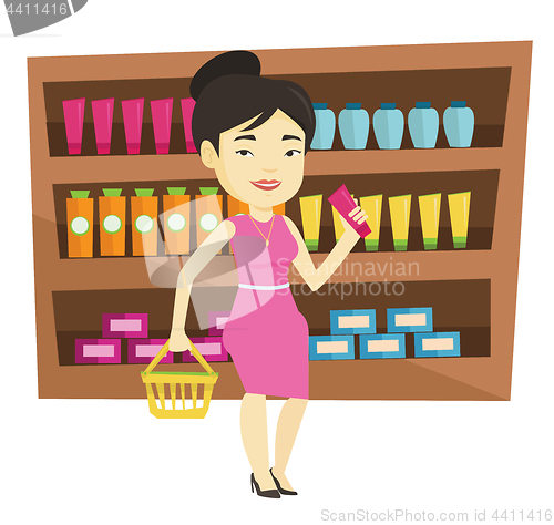 Image of Customer with shopping basket and tube of cream.