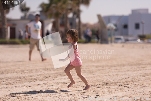 Image of little cute girl at beach