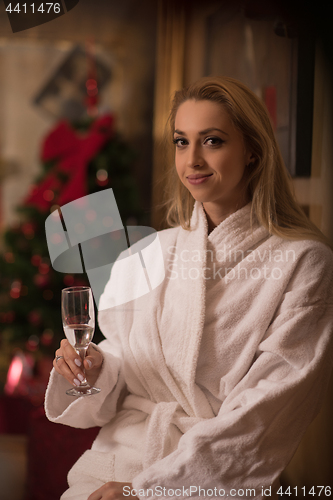 Image of woman drinking champagne at spa