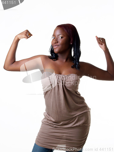 Image of Young black teen girl showing her biceps