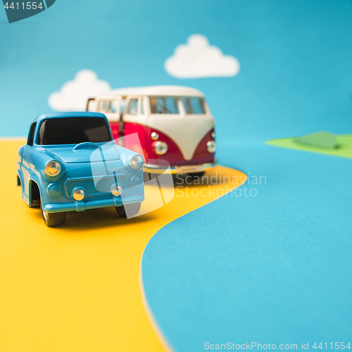 Image of Vintage miniature car and bus in trendy color, travel concept