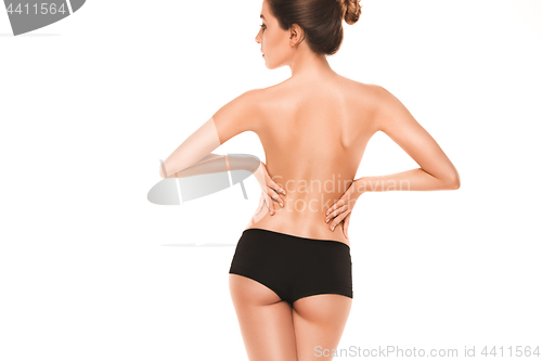 Image of Long pretty woman legs on white background