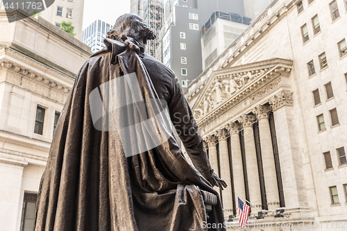 Image of View from Federal Hall of the statue of George Washington and the Stock Exchange building in Wall Street, New York City.