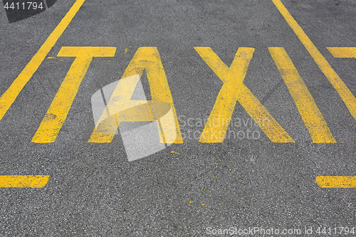 Image of Yellow Taxi Sign