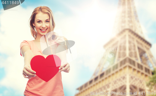 Image of happy woman or teen girl with red heart shape