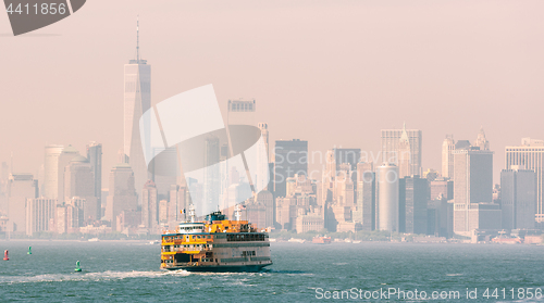 Image of Staten Island Ferry and Lower Manhattan Skyline, New York, USA.