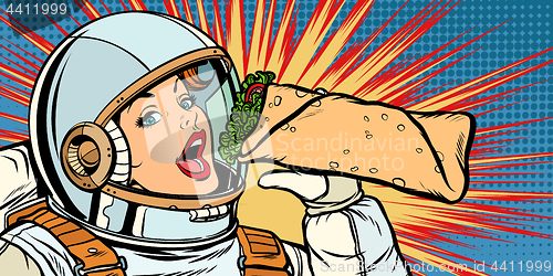 Image of Hungry woman astronaut eating kebab Doner Shawarma