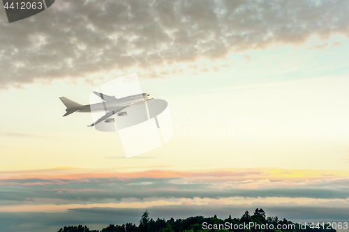 Image of an Airplane and the sunset sky
