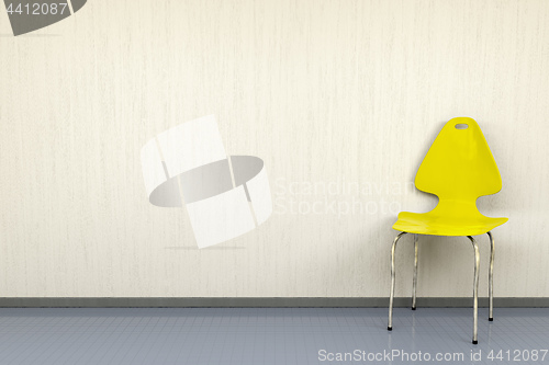 Image of yellow chair at a wall with space for your content