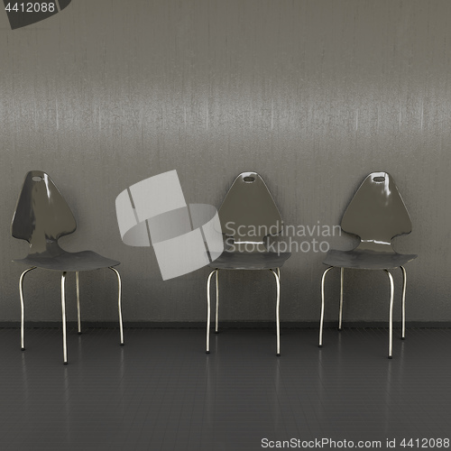 Image of three black chairs at a wall with space for your content