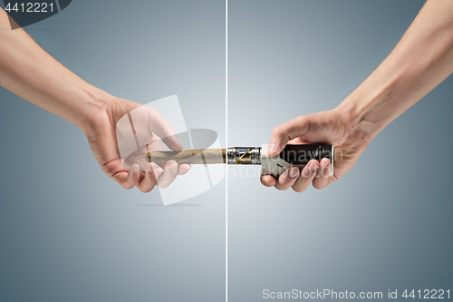 Image of Hand holding an electronic cigarette