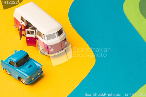 Image of Vintage miniature car and bus in trendy color, travel concept