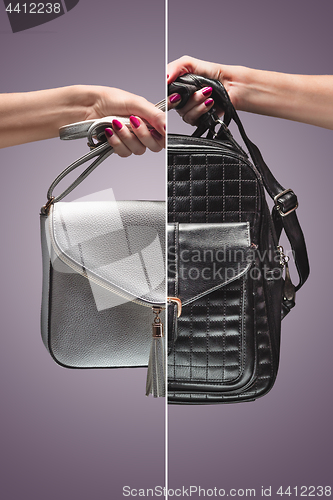 Image of Fashion. Female hand Stylish Trendy Handbag clutch