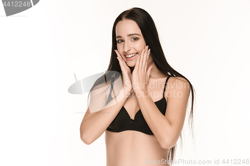 Image of The figure of girl in a swimsuit on studio background