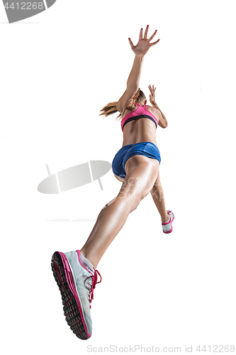 Image of The studio shot of high jump female athlete is in action