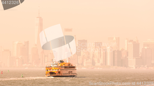 Image of Staten Island Ferry and Lower Manhattan Skyline, New York, USA.