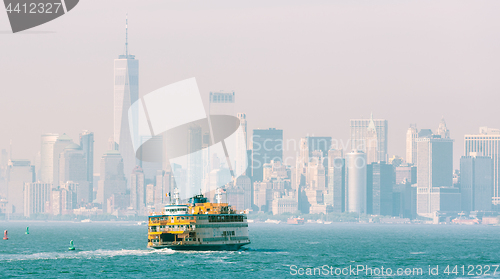 Image of Staten Island Ferry and Lower Manhattan Skyline, New York, USA.