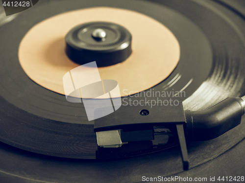 Image of Vintage looking Vinyl record on turntable