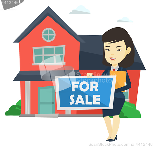 Image of Young female realtor offering house.