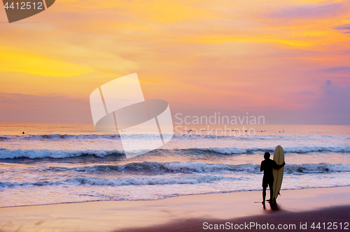 Image of Surfer stay on the beach